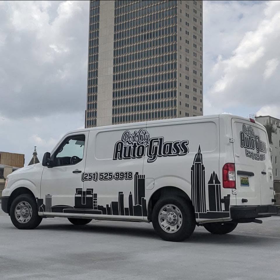 The branded Port City Auto Glass service van in downtown Mobile
